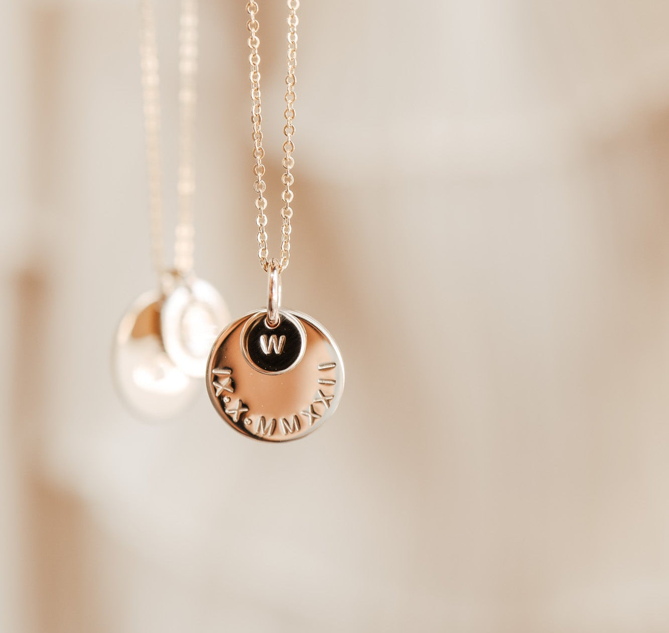 Personalised jewellery - KBN Jewellery - handmade jewellery – stacked pendant necklace – textured pendant – children’s name necklace – necklace for mum – birth flower symbol necklace – everyday necklace – perfect gift – small pendant stack – roman numeral pendant