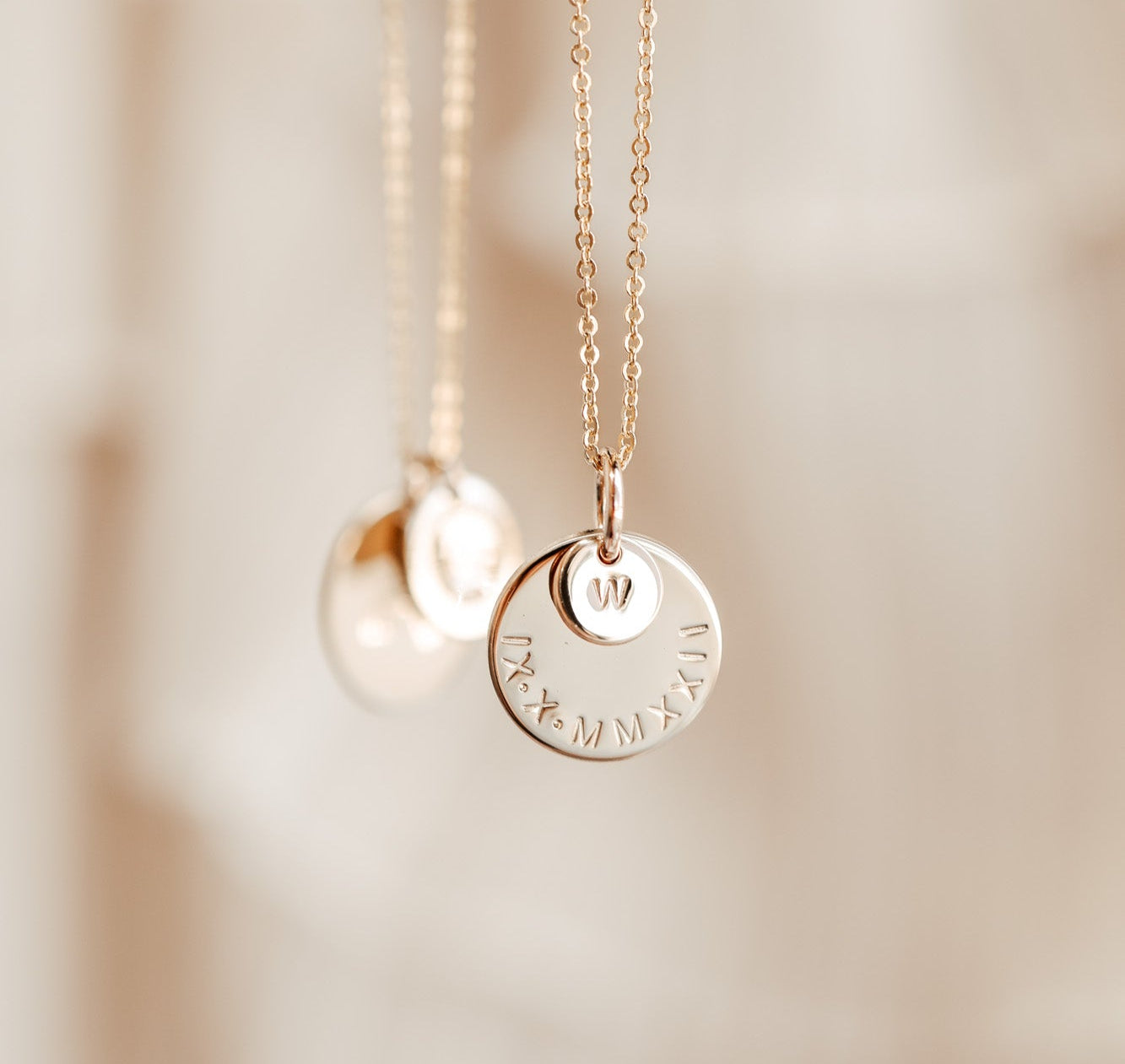 Personalised jewellery - KBN Jewellery - handmade jewellery – stacked pendant necklace – textured pendant – children’s name necklace – necklace for mum – birth flower symbol necklace – everyday necklace – perfect gift – small pendant stack – roman numeral pendant