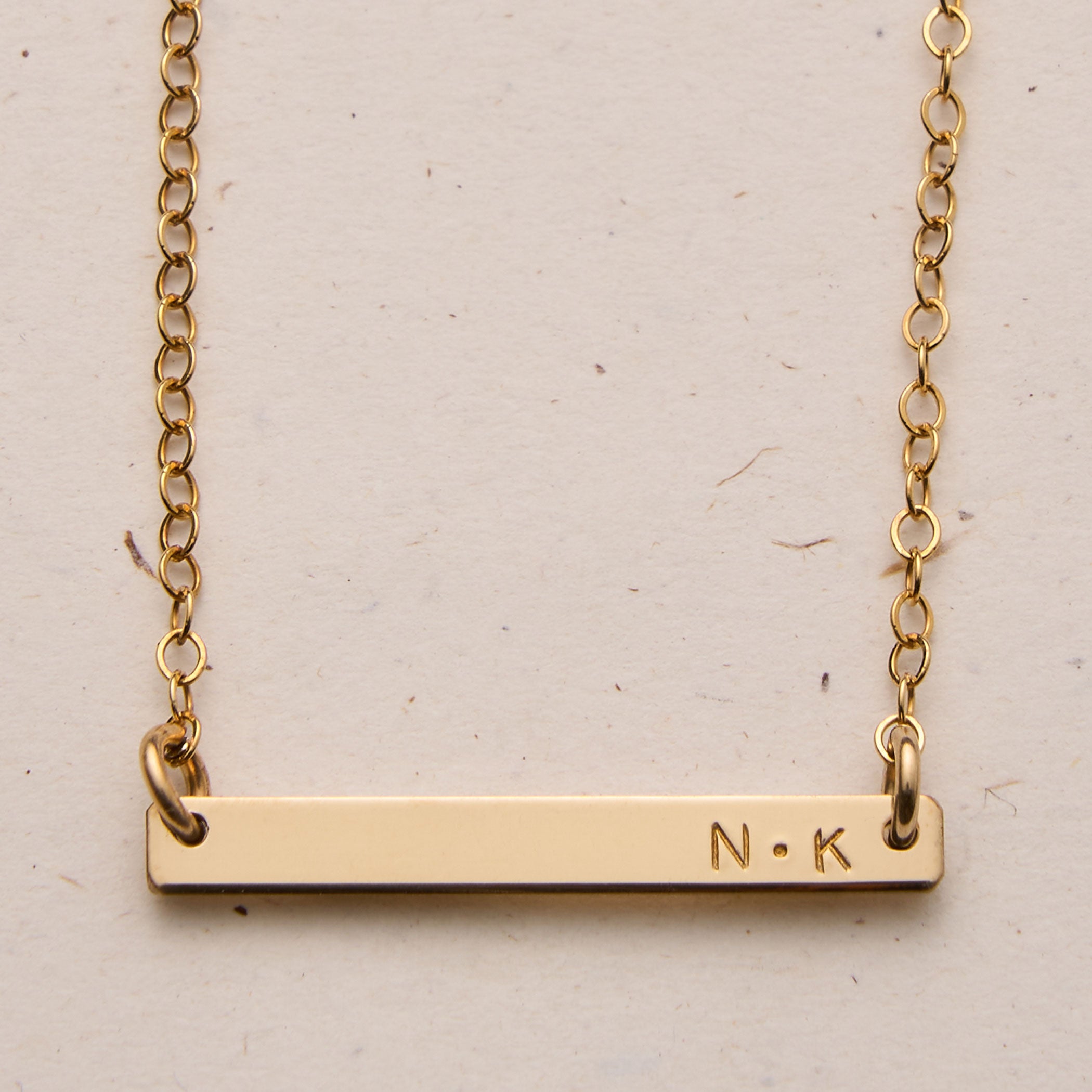 Personalised jewellery - KBN Jewellery - handmade jewellery – Personalised Jewellery gifts – Dainty jewellery- bar necklace – dainty bar necklace – personalised date necklace – roman numerals necklace – name bar necklace – words of affirmation necklace – tiny  bar necklace – layering necklace – layering necklace inspiration – wedding gift idea – wedding gift idea for bride  - long pendant necklace with additional small pendant – unique necklace – personalised bar necklace – dainty bar necklace