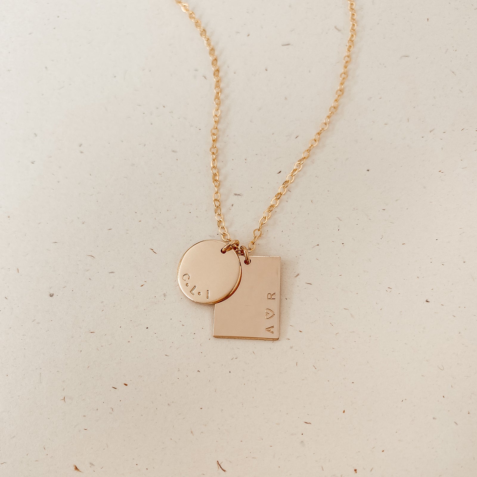 medium pendant round rectangle curved centred text tiny neat font goldfill sterling silver rose goldfill dainty delicate meaningful dates symbol children names roman numerals - Personalised jewellery – handmade jewellery – KBN jewellery – Australian made jewellery – initial necklace – rectangle and circle pendant – two pendant necklace – initial necklace – children’s name necklace – personalised words necklace – unique necklace