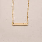 Personalised jewellery - KBN Jewellery - handmade jewellery – Personalised Jewellery gifts – Dainty jewellery- bar necklace – dainty bar necklace – personalised date necklace – roman numerals necklace – name bar necklace – words of affirmation necklace – tiny  bar necklace – layering necklace – layering necklace inspiration – wedding gift idea – wedding gift idea for bride  - long pendant necklace with additional small pendant – unique necklace – personalised bar necklace – dainty bar necklace