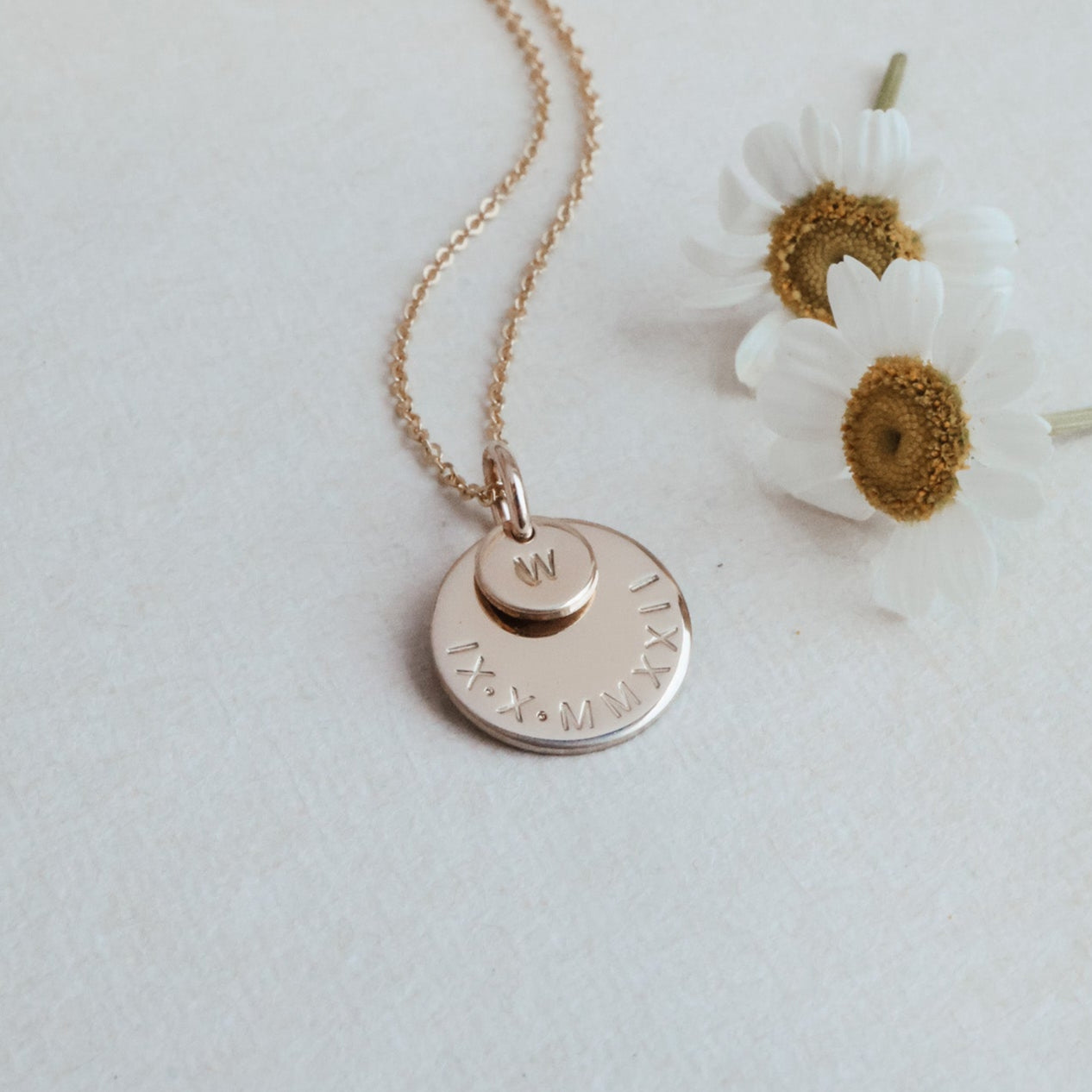 Personalised jewellery - KBN Jewellery - handmade jewellery – stacked pendant necklace – textured pendant – children’s name necklace – necklace for mum – birth flower symbol necklace – everyday necklace – perfect gift – small pendant stack – roman numeral pendant 