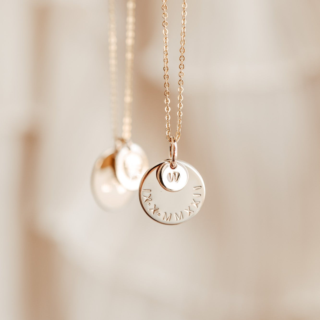 Personalised jewellery - KBN Jewellery - handmade jewellery – stacked pendant necklace – textured pendant – children’s name necklace – necklace for mum – birth flower symbol necklace – everyday necklace – perfect gift – small pendant stack – roman numeral pendant 