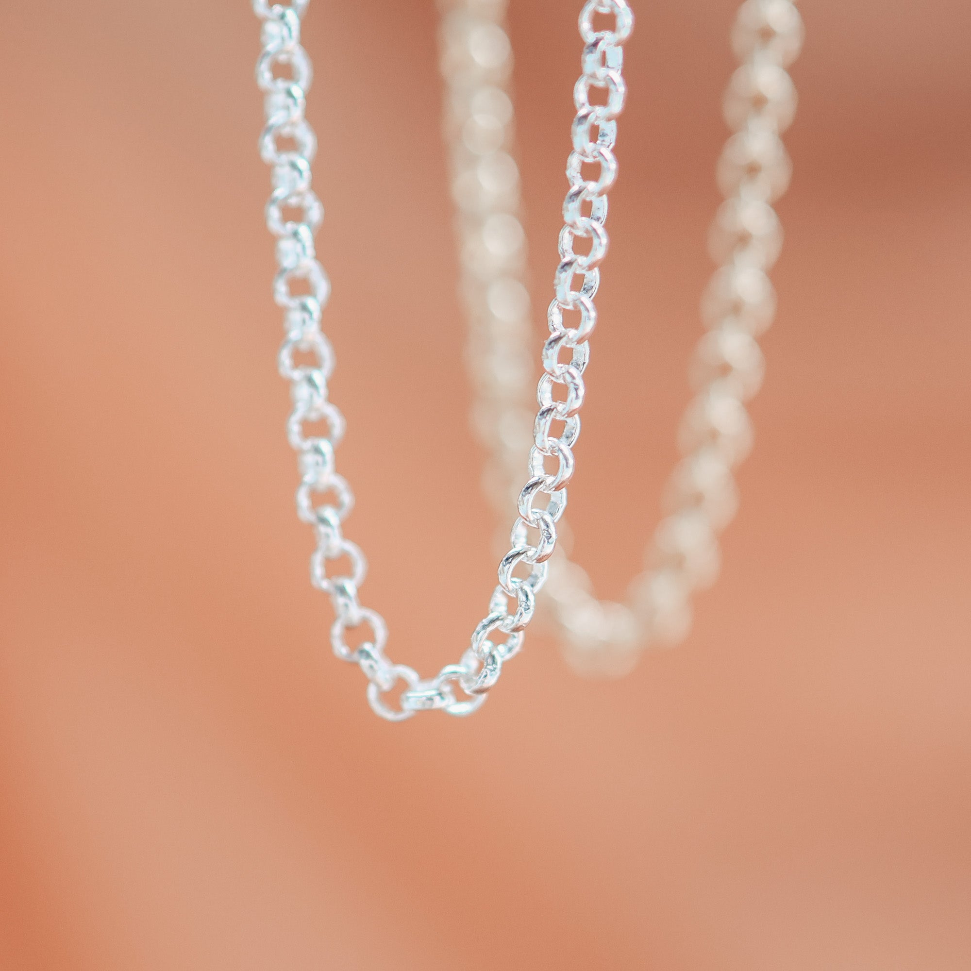 rolo bracelet, stacked bracelet flatlay featuring the rolo chain bracelet and a heart chain bracelet gold filled bracelet stacking bracelet