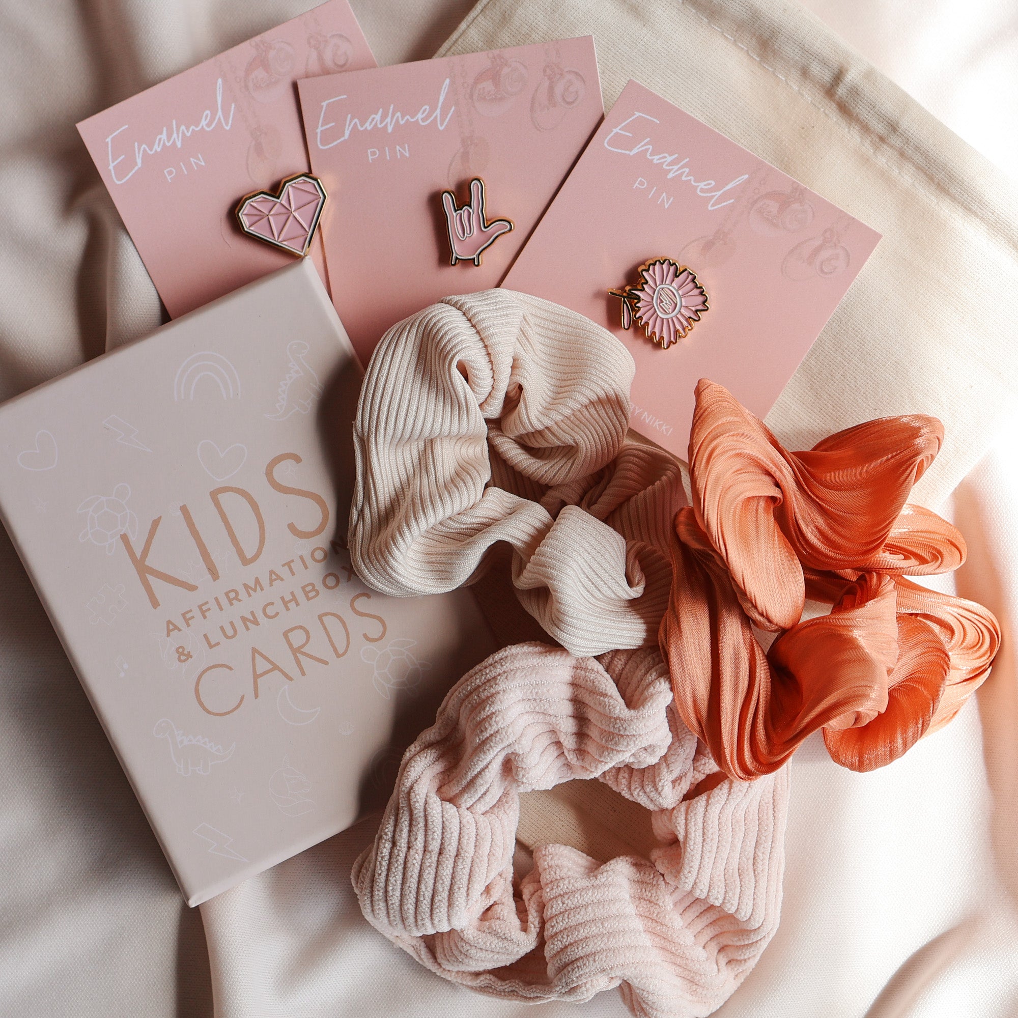 KBN Kids stay magic pack, affirmation cards, scrunchie and enamel pins pack.