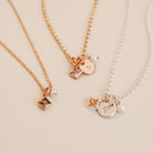 Two necklaces with square pendants on a light background - KBN Jewellery - Birthstone Necklace - Pearl Necklace