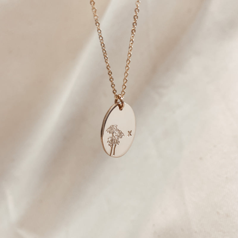 Personalised jewellery – handmade jewellery – KBN jewellery – Australian made jewellery – initial necklace – birth flower necklace – single pendant necklace with flower – birth flower necklace custom – custom birth month necklace – birth flower necklace with initial – oval pendant necklace – flower stamped necklace