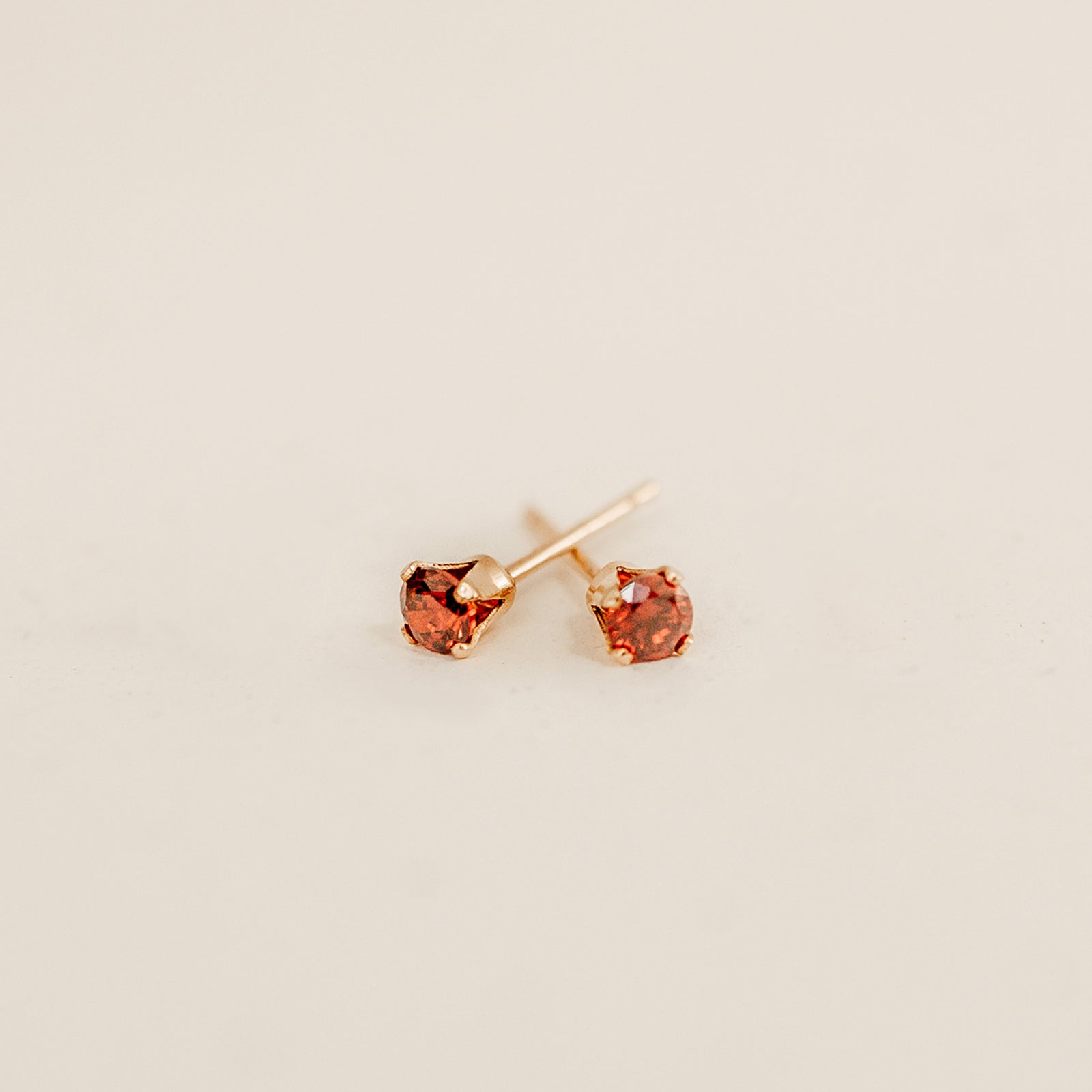 Personalised jewellery – handmade jewellery – KBN jewellery – dainty earrings – birth month earrings – birthstone earrings – affordable earrings – birthstone earrings  – birthstone studs – stacking earrings – stone earrings – January earrings – red stone earrings 