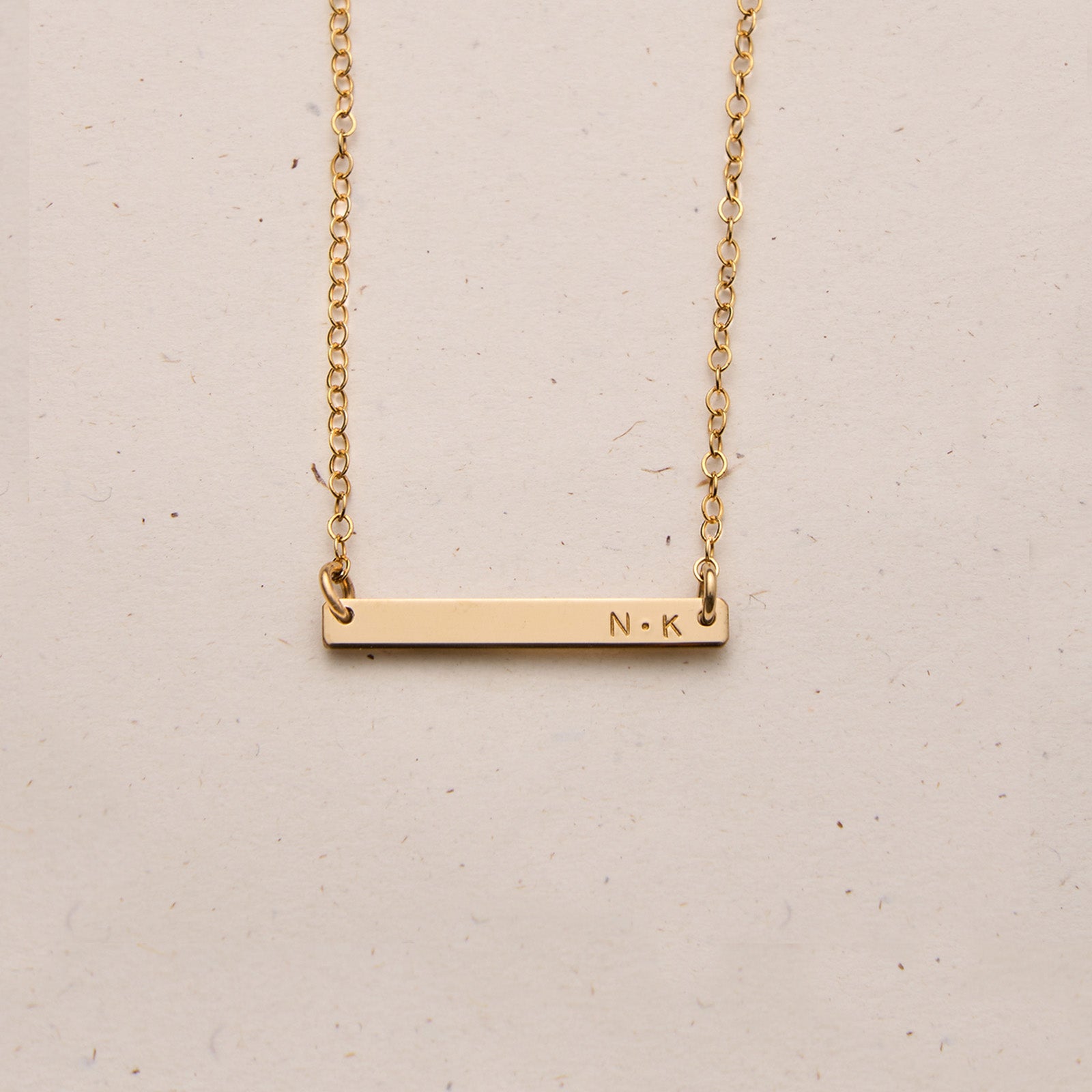 Personalised jewellery - KBN Jewellery - handmade jewellery – Personalised Jewellery gifts – Dainty jewellery- bar necklace – dainty bar necklace – personalised date necklace – roman numerals necklace – name bar necklace – words of affirmation necklace – tiny  bar necklace – layering necklace – layering necklace inspiration – wedding gift idea – wedding gift idea for bride  - long pendant necklace with additional small pendant – unique necklace – personalised bar necklace – dainty bar necklace